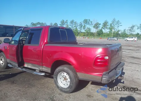 2002 Ford F-150 Lariat/Xlt z USA, uszkodzony, nr VIN 1FTRW07LX2KD47266